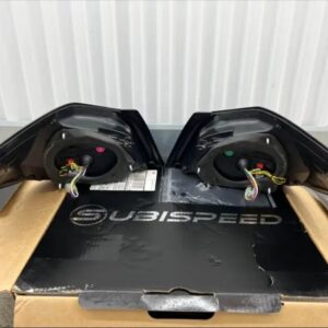 SUBISPEED EVOLUTION TAIL LIGHTS BY OLM CLEAR LENS, BLACK BASE, WHITE BAR - 15-21 WRX/STI