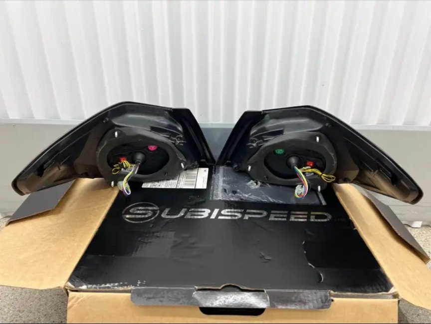 SUBISPEED EVOLUTION TAIL LIGHTS BY OLM CLEAR LENS, BLACK BASE, WHITE BAR - 15-21 WRX/STI